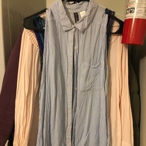 Sleeveless blue button down shirt